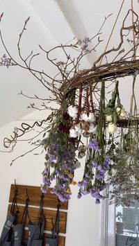 Ideal for a boho, festival, or summer fete themed wedding. It would look amazing hung in a marquee, teepee or any wedding breakfast room. This slightly wild, natural floral chandelier will dry over time and still look beautiful. All of the flowers are real and the design contains; hazel, contorted hazel, roses, lavender, limonium, cotton, craspedia, statice.