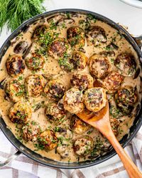 Meatballs with Mushroom Gravy - pork meatballs in a delicious creamy mushroom sauce served over mashed potatoes. #meatballs #mushrooms #recipe #gravy