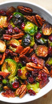 Roasted Brussels Sprouts with Bacon, Toasted Pecans, and Dried Cranberries is an easy Christmas side dish that will add colors and vibrancy to your holiday menu! #brusselssprouts #bacon #Christmas #Christmasrecipe #side #sidedish