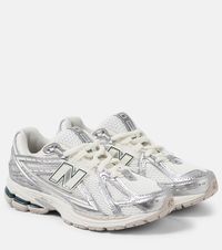 1906R running shoes in silver - New Balance | Mytheresa