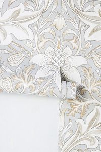 An elegant array of acanthus leaves circle a central floral motif in this ethereal wallpaper pattern. To calculate the square footage of your space, we recommend combining the width of each wall, then multiplying this number by your ceiling height. Next, divide this number by the square footage of a single roll of wallpaper to determine the number of rolls required. Always round up to account for pattern repeat and variation. Need help choosing the right wallpaper for your home? Read our guide t