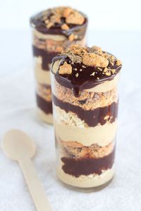 Chocolate Peanut Butter Crunch Trifles - layers of peanut butter pudding, chocolate ganache, crushed ritz crackers and butterfingers to make the perfect trifle.