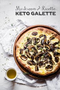 Savory galette filled with cheese and topped with roasted mushrooms. A tasty low-carb, grain-free and vegetarian meal in less than an hour! #keto #lowcarb #dinner #vegetarian #july4th #holidays