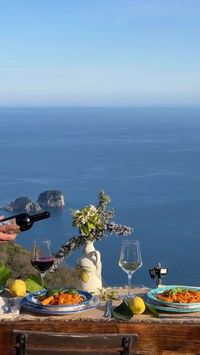 Italy 🇮🇹 Italia Travel | Hotels | Food | Tips on Instagram: "Pasta and Wine by this view through @campaniadavivere ‘s lens ☀️🍷🌊🍝 💡The first town to visit is certainly the one that gives its name to the whole Sorrento Coast. Sorrento is surrounded by hills and overlooks the clear sea, with the profile of the Vesuvius volcano on the background. Your @ 2nd will have lunch with you by this view soon!🥰 “DM us “Hotel” or click our bio link for exclusive hotel deals” 🎥 @campaniadavivere 📍Sorre