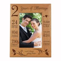 Engraved Anniversary Picture Frame Dimensions: 7.5" x 9.5" Frame holds a 5" x 7" photo Celebrate your special anniversary day with your lover by enjoying LifeSong Milestones Solid Wood Wedding Anniversary Picture Frame. Get this gift as a keepsake to remember your special day you made the ultimate bond. LifeSong Milestones has created the perfect First Anniversary photo frame gift. Wooden picture frames were designed, handcrafted, and engraved in the USA by © 2019 LifeSong Milestones.