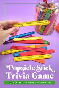 Love DIY crafts? Looking for learning activities for kids? Then check out our free printable to make a fun DIY popsicle stick trivia game.  Use our 200+ free trivia questions or make up your own!   #freeprintable #summeractivities #kidcraft #popsiclestickcraft #learning #popsiclesticktriviagame #diygame