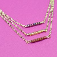 Happy FRIDAY, guys!  Man, it’s been a long time coming this week.  I have a fun weekend project for you that’s also perfect for a ladies craft night.  These delicate layering necklaces are easy to make, and you can share beads and wire among a group to keep costs down and get lots of variety!...