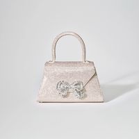 Shop the Champagne Rhinestone Bow Envelope Mini Bag at self-portrait's official online store now. Free Next Day delivery and returns on all UK orders.