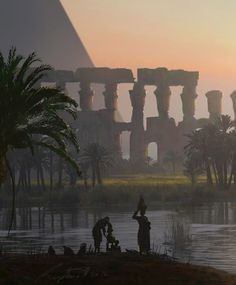 two people are standing near the water in front of an egyptian temple at sunset with palm trees