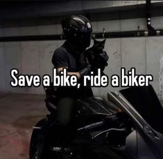 a person on a motorcycle with the words save a bike, ride a biker