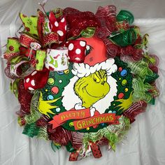 a wreath with the grinchmas character on it