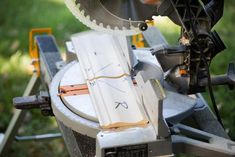 a circular saw is being used to cut wood