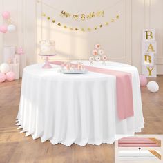 a white table topped with a cake next to pink and gold decorations on top of a hard wood floor