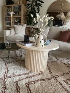 a living room filled with furniture and decor