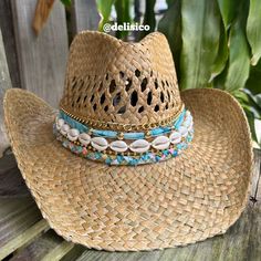 This coastal cowgirl hat has blue fabric with gold details and shells. A coastal cowgirls dream! All hats are around 22-24 inches inside but come with an adjustable string that can tighten the hat inside. Check out my Instagram @delisico *PLEASE MESSAGE ME IF YOU NEED FOR A SPECIFIC DATE. BIRTHDAY, CONCERT, EVENT* Coastal Cowgirl Beaded Hat, Coastal Cowgirl Hat Ideas, Cowboy Hat Jewelry, Coastal Cowgirl Trucker Hat