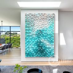 a living room filled with furniture and a painting on the wall