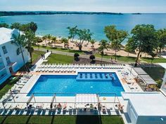 an aerial view of the pool and beach area