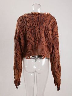 Crafted with a unique design and tassel detailing, this sweater will make a statement. The loose fit provides comfort and versatility, perfect for any occasion. - Color: Brown- Style: Sweater- Pattern Type: Solid- Sleeve Length: Long Sleeves- Neckline: Round Neck- Fabric: Wool Blend- Closure Type: Pullover- Details: Hollow Out- Fit Type: Loose Fit- Occasion: Casual- Gender: Women- Size: S, M, L (Unit: cm) Bohemian Chunky Knit Top For Winter, Winter Long Sleeve Tops With Tassels, Bohemian Chunky Knit Tops For Fall, Trendy Fringe Tops For Winter, Long Sleeve Tops With Tassels For Fall, Brown Fringe Tops For Fall, Bohemian Long Sleeve Cropped Sweater For Fall, Bohemian Crew Neck Cardigan For Fall, Fall Bohemian Cardigan With Crew Neck