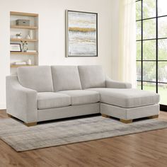 a living room scene with focus on the corner sofa