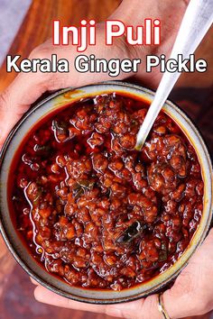 two hands holding a bowl of kerala ginger pickle