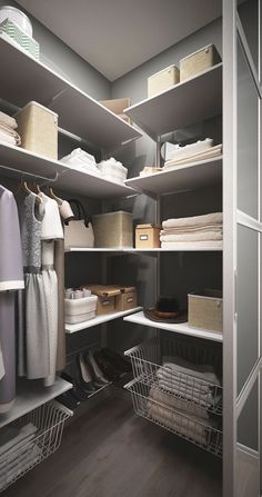 an organized closet with clothes and baskets