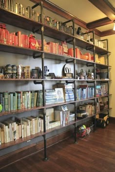 the bookshelves are filled with many different types of books