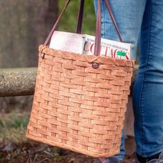 This functional Amish woven tote makes it the perfect grab-and-go tote. The flexible handwoven wicker craftsmanship of this market tote basket gives it an enchanting personality that makes it fun to take with you any day of the week. This comfortable wicker tote bag is easy to carry and gives you quick access to all your daily belongings so you can soon find this market tote basket becoming your go-to bag for work, shopping, gym or travel. This versatile wicker tote bag is sized big enough to fi Shopping Totes, Everyday Tote Bag, Basket Tote, Everyday Tote, Mom And Grandma, Market Tote, Market Shopping, Day Of The Week, Leather Handle