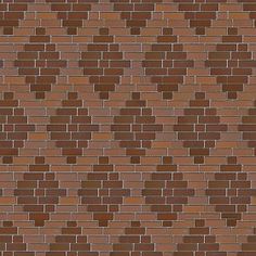 a brown brick wall with small squares on it