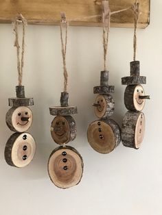 wooden ornaments are hanging on the wall