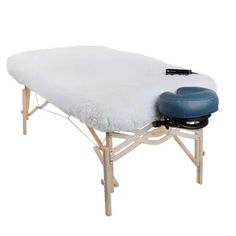 Earthlite's DLX Digital Warmer boasts a soft fleece cover and advanced digital warming pad that allows for customizable heat up to 135°F and timer settings for up to 10 hours. With overheat protection and automatic shutoff, you can feel safe and secure. Features TWO-IN-ONE MASSAGE TABLE WARMER & FLEECE PAD - Your clients will stay warm and cozy this premium 1” (2.5cm) thick fleeced heating pad in the coldest of environments. PROPRIETARY DIGITAL TOUCH SCREEN HAND CONTROL – Makes programming easy. Massage Equipment, Massage Tables, Professional Massage, Massage Table, Cooling Blanket, Towel Warmer, Table Pads, Heating Pad, Self Service