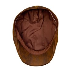 The Saint Martin Faux Leather Driver Cap offers warmth, style and durability for any season. These caps are popular men's accessories for fall and winter outfits, but you can tastefully pair this faux brown leather driver hat with warmer weather outfits as well. Soft and incredibly comfortable, this cap is made from realistic, hide-like, 100% polyester material on its interior and exterior alike. This hat is also available in black and brown color options, both of which are neutral enough to be