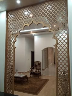 a living room with an ornate wooden door