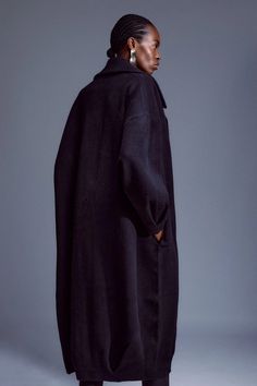 Invest in outerwear this cool season with this timeless coat. Crafted from sumptuous wool, this piece has an oversized effect that falls to a long-length with a large notched collar, and long sleeves. An ideal choice for layering over cashmere jumpers.Notched collarWoolLong lengthLong sleeves Knit Coat, Oversize Knit, Knitted Coat, Notched Collar, Karen Millen, Long Length, Wool Blend, Layering, Cashmere