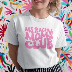 New! Ms. Rachel Moms Club Graphic T-Shirt In White. Mens/Unisex Cut And Sizing For Comfortable Fit. 100% Cotton. Crew Neck. Short Sleeves. White Color Tee With Pink Design. Style Tags # Parenting Motherhood Coparent Help Meme Social Show Guys Mens Womens Urban Outfit Casual Classic Unique Custom Bold Cool Handmade Essential Basic All Seasons New To Poshmark? Save $10 On Your First Purchase When You Sign Up For An Account With The Invite Code: Freshfit Ms Rachel Shirt, Help Meme, Ramones T Shirt, Ms Rachel, Designs Quotes, My Hero Academia Shirt, Retro Fashion Women, Red Crewneck, Linen Tee