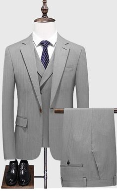 The Light gray 3 piece suit is part of our formal wear collection where the formal look is enhanced through our unique double breast notch lapel waistcoat. Light grey suit making it ideal for any occasion and any season. Elegant Gray Double Breasted Suit For Semi-formal Occasions, Semi-formal Gray Tuxedo With Notch Lapel, Gray Notch Lapel Tuxedo For Semi-formal Occasions, Gray Notch Lapel Tuxedo For Semi-formal Events, Gray Tuxedo Blazer With Notch Lapel, Gray Notch Lapel Tuxedo, Gray Suits With Lapel Collar For Work, Gray Formal Blazer With Suit Collar, Gray Blazer With Suit Collar For Formal Occasions