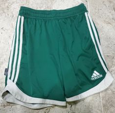 NICE CLASSIC 2012 ADIDAS CLIMACOOL GREEN AND WHITE SOCCER SHORTS MEN'S SIZE MEDIUM. Condition is "Pre-owned". Shipped with USPS First Class. Awesome classic Adidas Climacool soccer shorts in men's size medium. These are true soccer shorts and DO NOT have pockets. They do have a drawstring. Overall condition is good with normal wear. Please review all pictures. Bid with confidence as I normally ship a day after payment is received. I'm willing to accept offers and ship internationally. Please rev Casual Green Adidas Shorts, Adidas Green Shorts, Adidas Green Sporty Shorts, Adidas Sporty Green Shorts, Sporty Green Adidas Shorts, Adidas Green Sports Shorts, Green Sportswear Bottoms With Three Stripes, Adidas Green Sportswear Bottoms, Green Athletic Shorts For Sports Events