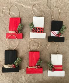 four small christmas gift bags tied with twine