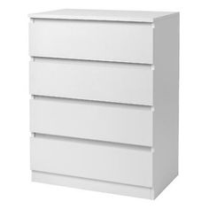 a white dresser with three drawers on it