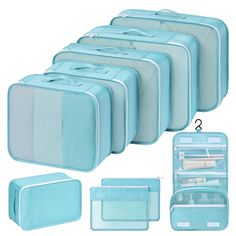 six pieces of blue luggage with various compartments