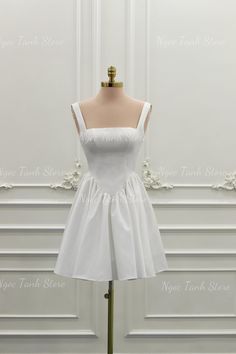 - Name & Type: Satin Short Wedding Dress. A-line Short Wedding Dress. Satin Party Dress. Minimalist Short Wedding Dress. Custom Short Wedding Dress. - Material: Satin. - Decoration: Pleated. - Color: White, Ivory. - Size: Customized according to personal measurements. - Length: Above the knee, (can be customized). - Sleeves: Sleeveless. - Front: Pleated. - Back: Low back, Knitted. We accept custom orders according to your requirements and needs. (please message me for quick response and support). - Product lead time is 6-8 weeks. - Free shipping from 5-10 business days. - Express shipping from 3-5 business days for $100. - Note: Due to lighting and contrast conditions, the color of the product in the picture may be slightly different from the actual color (not significant). Please understa Satin Short Wedding Dress, Wedding Dresses Minimalist, Short Wedding Dresses, Dress Minimalist, Dresses Satin, Minimalist Wedding Dresses, Satin Short, Wedding Dresses Satin, A Line Shorts