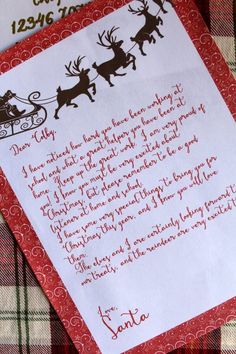 a red and white plaid table cloth with a christmas poem on it