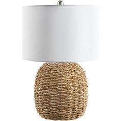 a wicker table lamp with a white shade on the top and bottom part of it