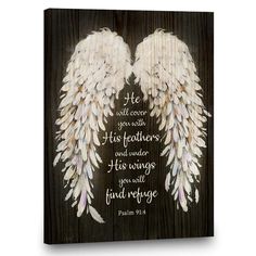 an image of two white angel wings with the bible verse on it's side