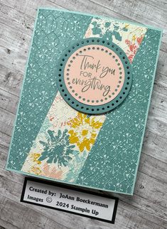 a close up of a card on a wooden surface with the words thank you for everything