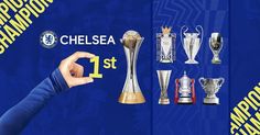 the chelsea team is holding up their trophies in front of an advertise board