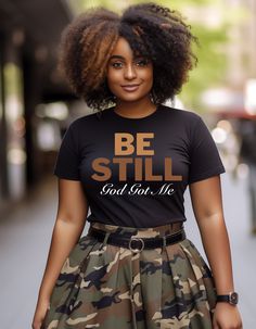 Find peace and inspiration with our 'Be Still God Got Me' T-Shirt. Perfect for women and men, this faith-based graphic tee features a motivational Christian quote. Shop now for your inspirational clothing! Faith-based inspirational clothing and Christian quote shirt. ♥︎KeyFeatures♥︎ -High-quality, soft, and durable cotton fabric -Ideal for casual wear, fashion-forward outfits, and making a statement -Available in various sizes ♥︎SIZING♥︎ Kindly consult the size chart provided. To ensure a precis Inspiration Tshirts Ideas, Styling A Graphic Tee Plus Size, Womens Tshirt Designs Graphic Tees, Comfy Cute Style, Graphic Tee Outfit Baddie, Cute Tshirt Designs Graphic Tees, Dressy Tops With Jeans, T Shirt Ideas For Women, How To Dress Up A Tshirt