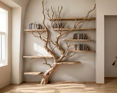 a tree shaped shelf with books on it