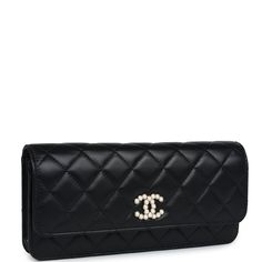 This Chanel small pearl clutch with chain black lambskin leather with gold hardware, and features tonal stitching, a pearl CC magnetic closure, and has an interwoven and gold tone chainlink shoulder strap.The interior is lined in black and white polka dot canvas and has one front slip pocket, 2 main interior pockets, and one zipper pocket.Collection: REVOrigin: ItalyCondition: New and never worn (plastic on hardware)Accompanied by: Chanel box, Chanel dustbag, carebook, felt, retail UPC, ribbonMe Chanel Clutch With Chain, Chanel Clutch Bag, Pearl Clutch, Chanel Clutch, Chanel Box, Chanel Pearls, Latest Bags, Prada Handbags, Chanel Black