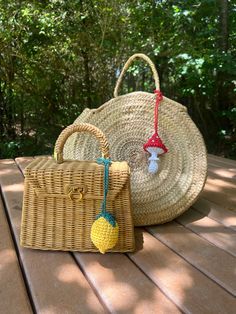 Handcrafted bag charms are adding   a splash of color and fun to your summer days and adventures. Big lemon looks perfect on a farmer's tote bag or beach straw bag, and a smaller one will add some Sicilian mood to your urban outfit.   Each lemon is unique and can have little differences from the pictures. Fun Handmade Travel Bag, Handmade Yellow Straw Bag For Summer, Handmade Yellow Straw Summer Bag, Handmade Yellow Summer Straw Bag, Bag Accessories Keychain, Tote Bag Accessories, Farmers Market Bag, Handcrafted Bags, Raffia Bag