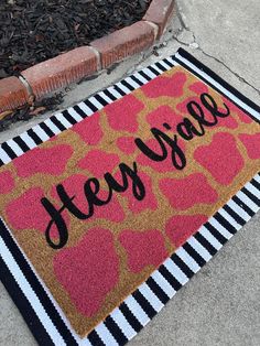 a door mat with the words hello peace on it sitting in front of a sidewalk